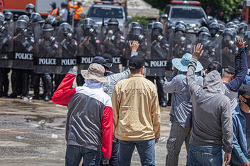 The fight between citizens and the police in the insurgency,uprising,People causing rioting against the government.