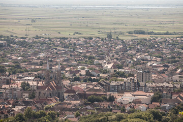 Aerial panorama of Vrsac, in Voivodina, Serbia, during a cloudy sunset, from the Vrsacki Breg, or Vrsac hill, a major city in Eastern Serbia.