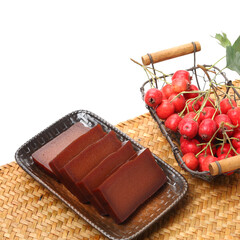 Hawthorn fruit cake isolated in white background