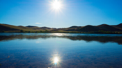Landscape of the river and the sky in sunny weather.