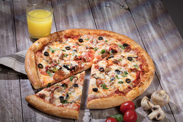 Pizza On A Wooden Table
