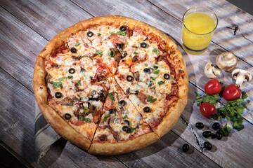 Pizza On A Wooden Table