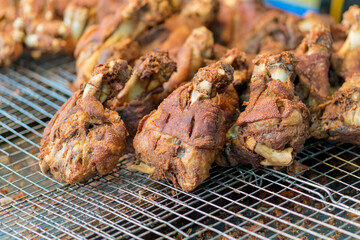 fried pork leg knuckle cooked in Thai style at the market