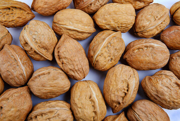 Background. Walnut covers the entire surface.