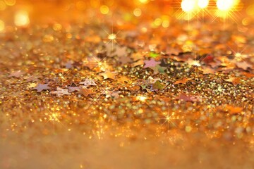 New Year and Christmas shiny texture.Wallpaper  shining glitter phone.Gold stars in gold glitter.Winter festive background with golden bokeh.Golden glitter  background
