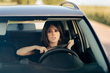 Female Driver Fastening Seat Belt for Safe Driving