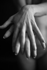 Details of body black and white portrait of beautiful girl, fashion and art