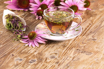 Obraz na płótnie Canvas Tea drink with dried Echinacea purpurea is used in folk medicine as an antiviral