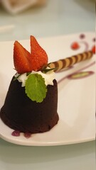 molten lava cake with strawberry on top