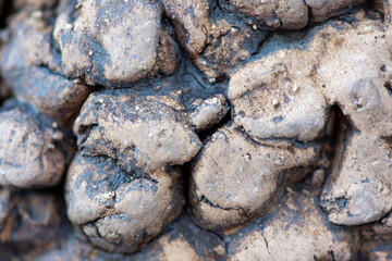Wall on the park of stone figures