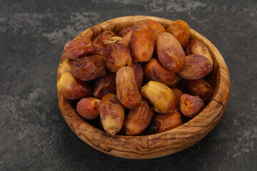 Sweet tasty dry dates in the basket