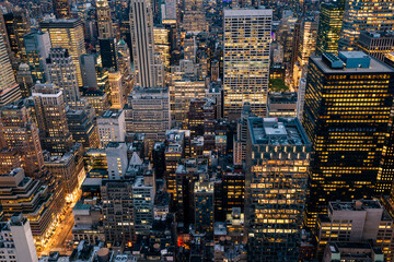 Fototapeta na wymiar Night lights view of crowded Office Buildings of Manhattan New York City Skyline