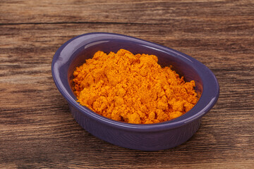 Tumeric powder in the bowl