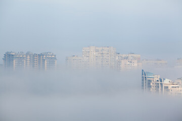 Highrise residential buildings in the fog