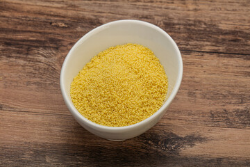 Raw cous cous heap in the bowl