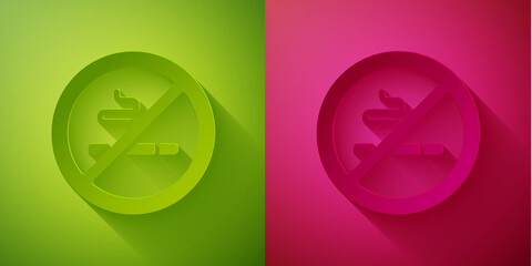 Paper cut No Smoking icon isolated on green and pink background. Cigarette symbol. Paper art style. Vector.