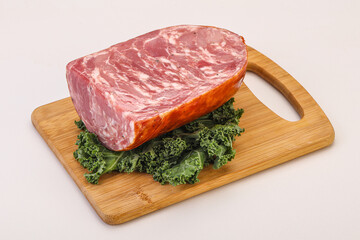 Beef ham piece over board