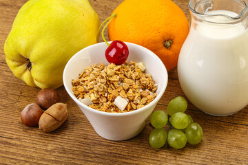 Breakfast with granola and milk