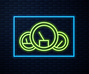 Glowing neon line Speedometer icon isolated on brick wall background. Vector Illustration.