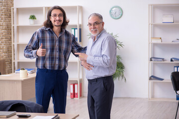 Fototapeta premium Two employees working in the office