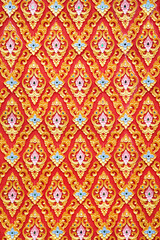 Colorful stained glass and gold Thai traditional style in temple Thailand background