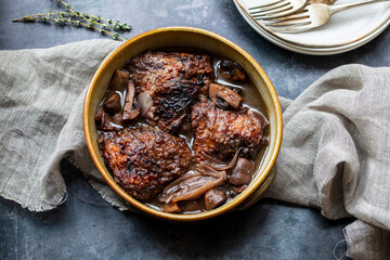 Cock au vin, French dish of chicken braised in wine