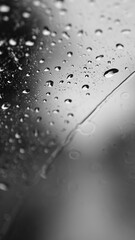 Raindrops on the windshield of the car. Focus selected