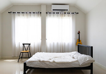 Bedroom in soft light colors.