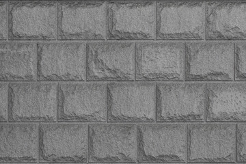 Rough gray stone bricks wall as texture, background