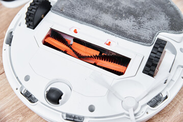 Repair robot vacuum cleaner, closeup. Household appliance service