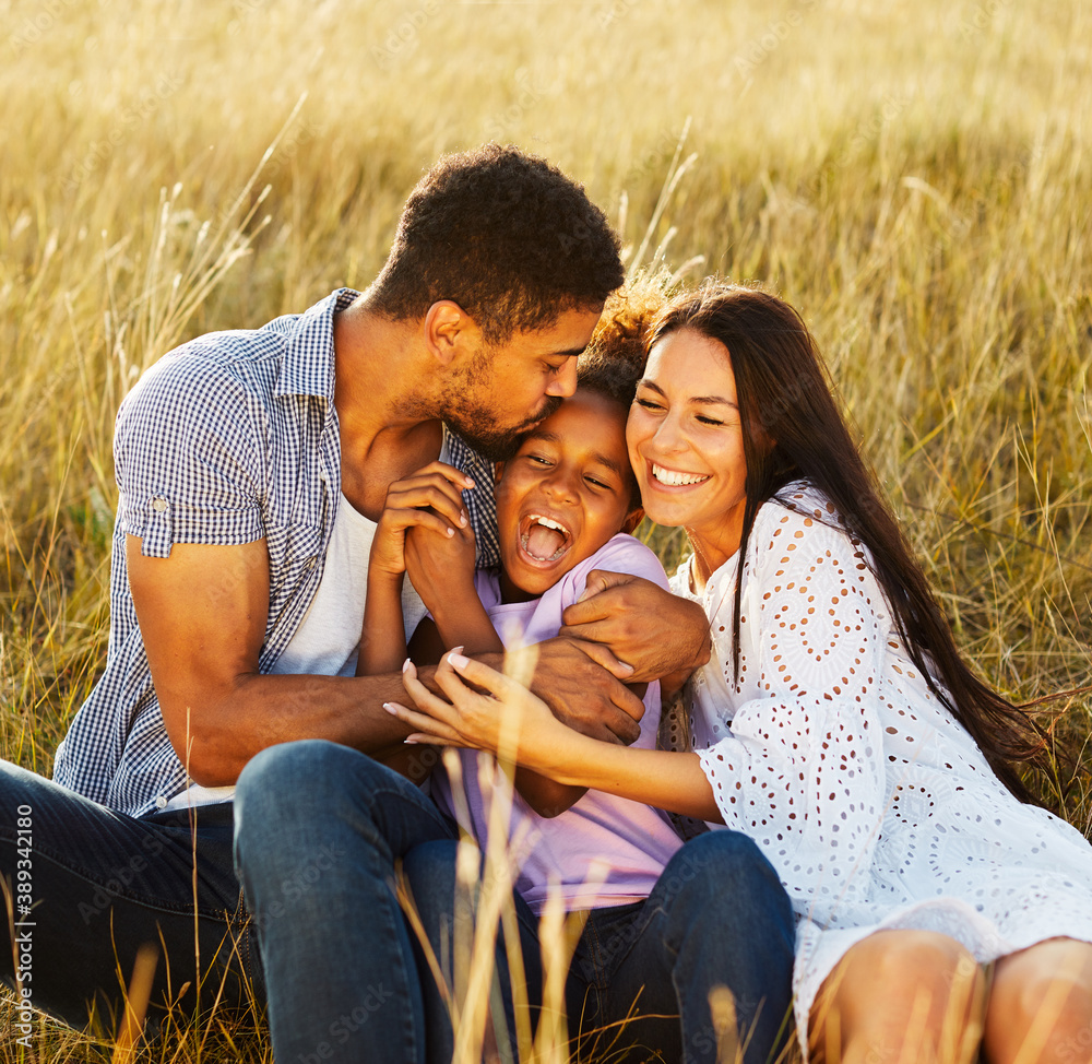 Wall mural child daughter family happy mother father love fun together girl cheerful field outdoor natur summer