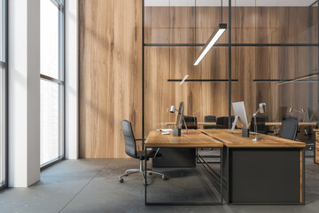 Wooden office tables with computers view on the city, office room with big windows