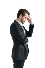 Side portrait of thoughtful young businessman, isolated