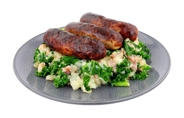 Traditional Irish Colcannon and sausage meal, Colcannon is made with mashed potato and kale or cabbage, isolated on a white background
