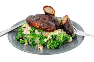 Traditional Irish Colcannon and sausage meal, Colcannon is made with mashed potato and kale or cabbage, isolated on a white background