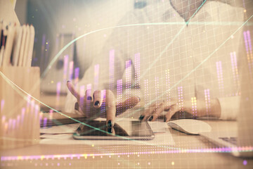 Double exposure of forex chart sketch hologram and woman holding and using a mobile device. Financial market concept.