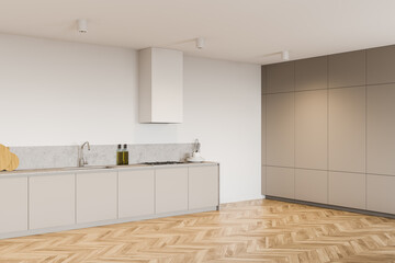 White kitchen corner with gray cupboards