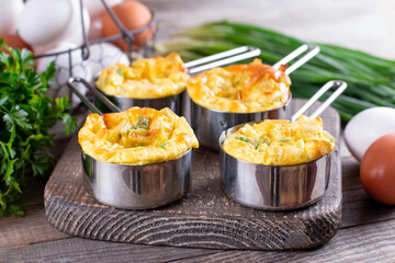 Egg bites, omelet muffin with vegetables, baked eggs with herbs, keto, ketogenic diet