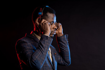 Cool african american man on dark background