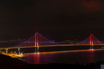 Fototapeta na wymiar Osmangazi Bridge (Izmit Bay Bridge). IZMIT, KOCAELI, TURKEY. Longest bridge in Turkey and the fourth-longest suspension bridge in the world by the length of its central span.