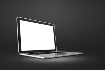Laptop computer on black office scene background