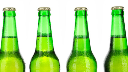 beer bottles with water drops on white background. green bottle with beer