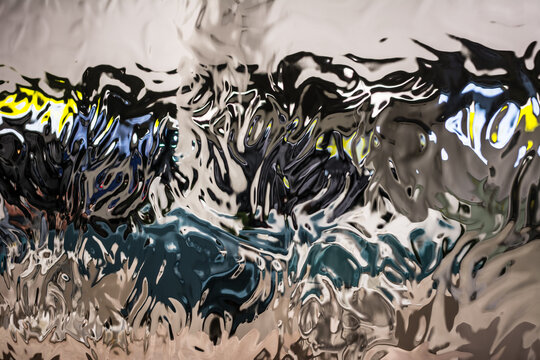 The texture of liquid Silver metallic surface.