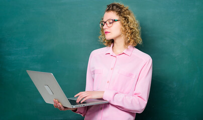 Remote job. Teacher notebook searching information chalkboard background. Online schooling concept....