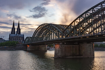 Cologne Cathedral and Hohenzollern Bridge at twilight, Germany