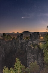 Fototapeta na wymiar Beautiful starry sky in a night in the Saxon Switzerland National Park in Germany
