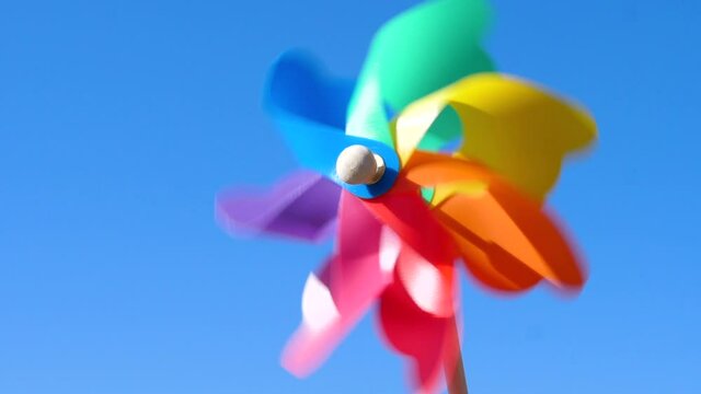 toy windmill colored concept of green energy