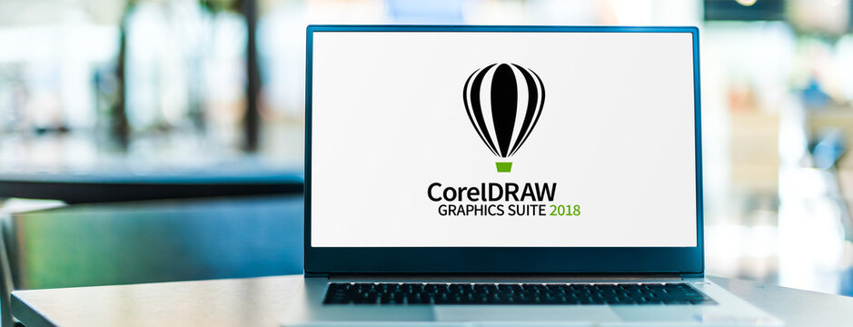 Laptop computer displaying logo of  CorelDraw Graphics Suite