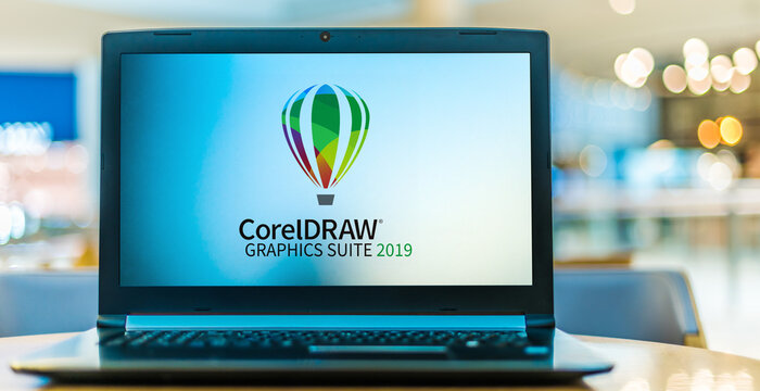 Laptop computer displaying logo of  CorelDraw Graphics Suite