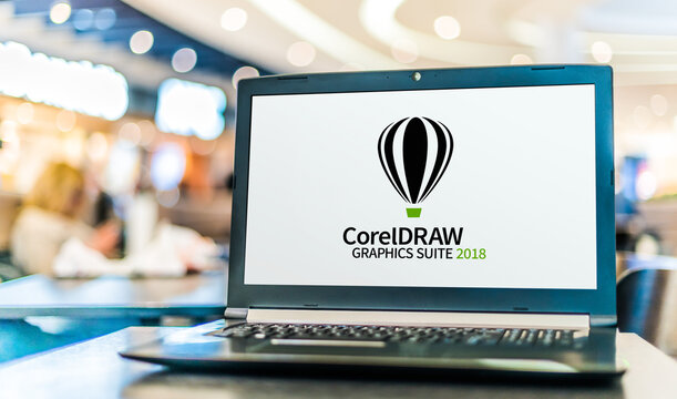 Laptop computer displaying logo of  CorelDraw Graphics Suite